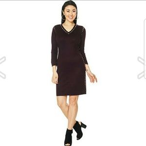 CK studded V-neck sweater dress.